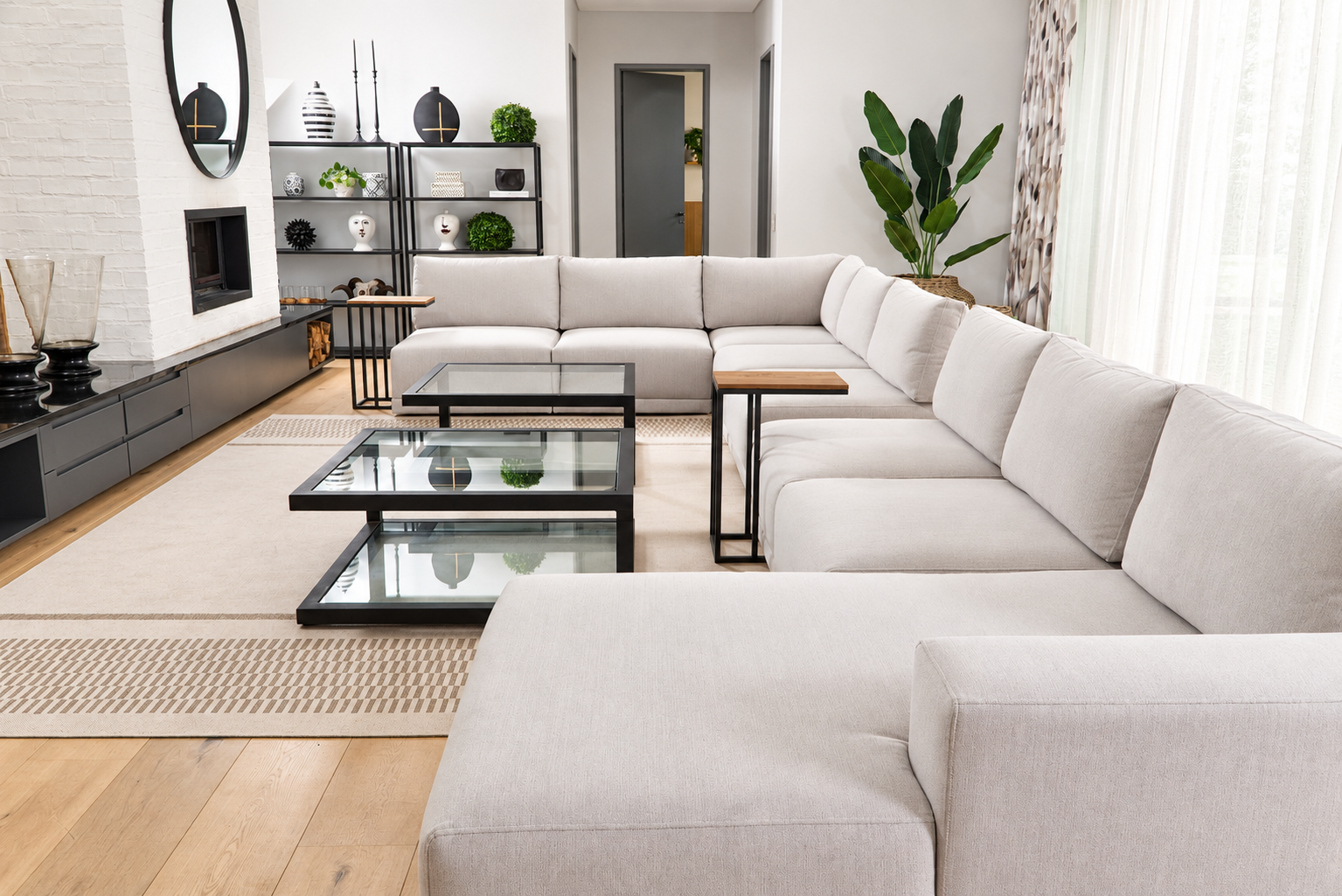Light upholstered sectional sofa in a bright living room